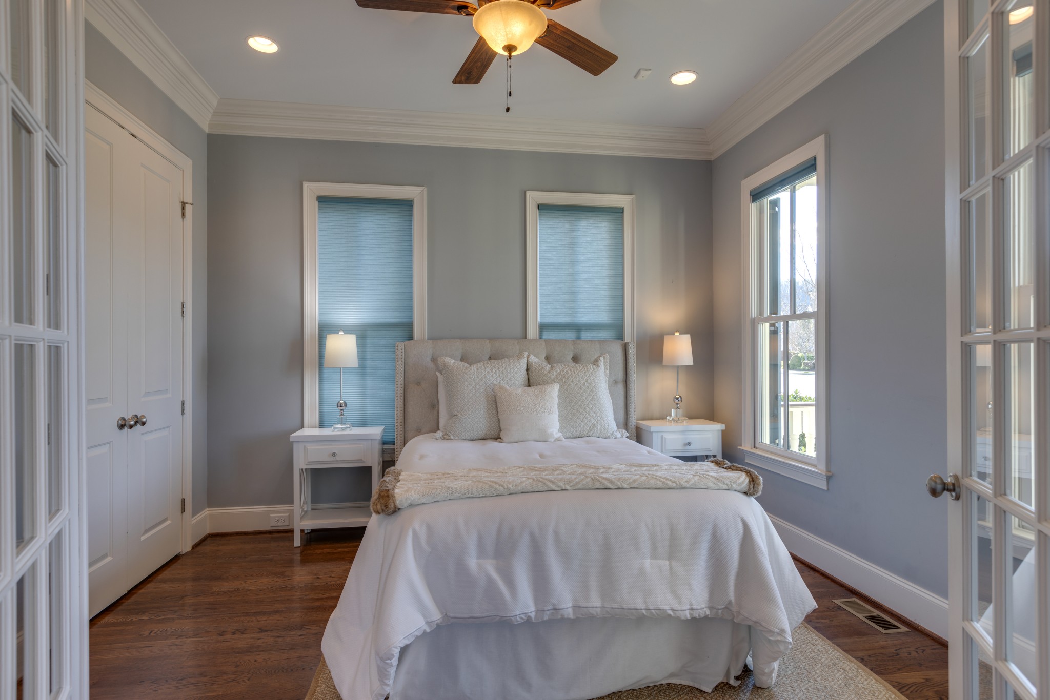 2019 Tabitha Drive Franklin, TN 37064 - Photo 11 of 47 a bedroom with a bed and a chandelier