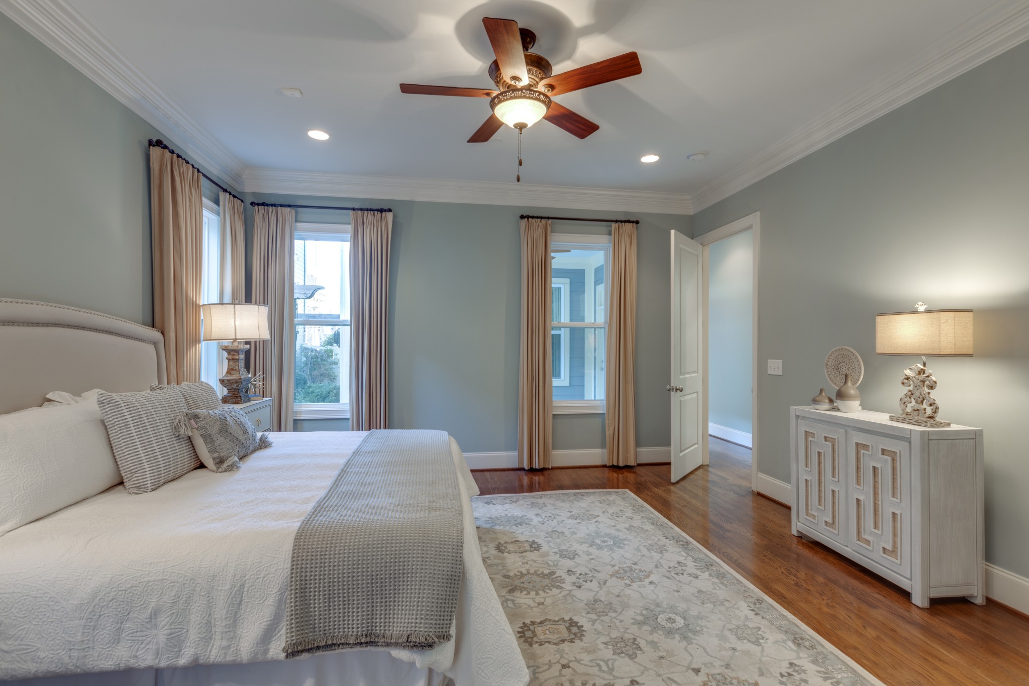 2019 Tabitha Drive Franklin, TN 37064 - Photo 30 of 47 a spacious bedroom with a bed a chandelier and windows