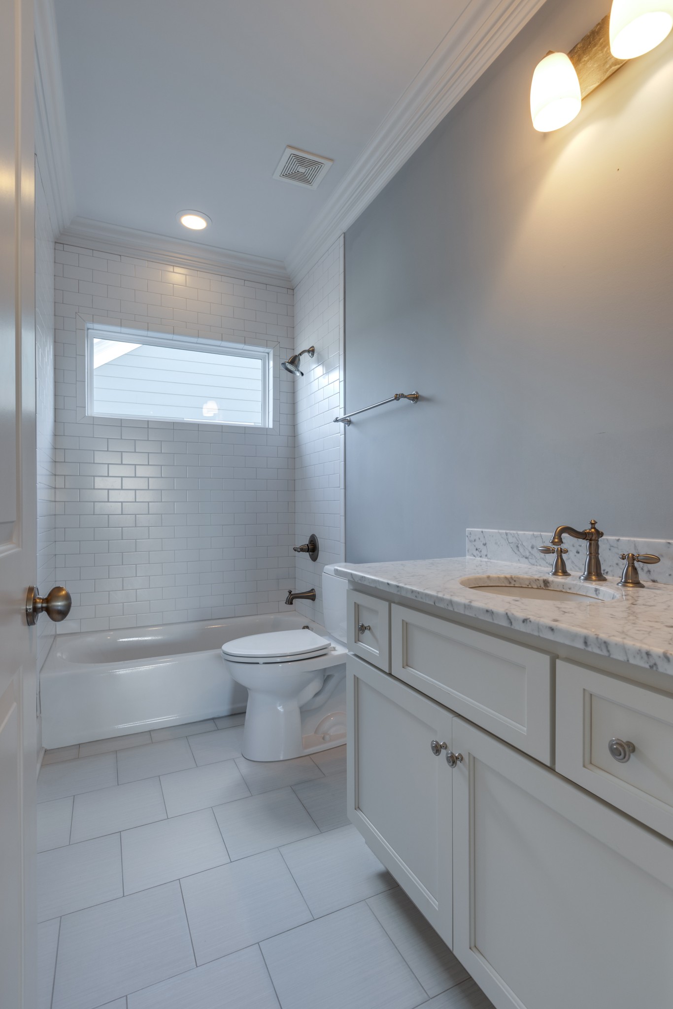 2019 Tabitha Drive Franklin, TN 37064 - Photo 46 of 47 a bathroom with a granite countertop sink a toilet and bathtub