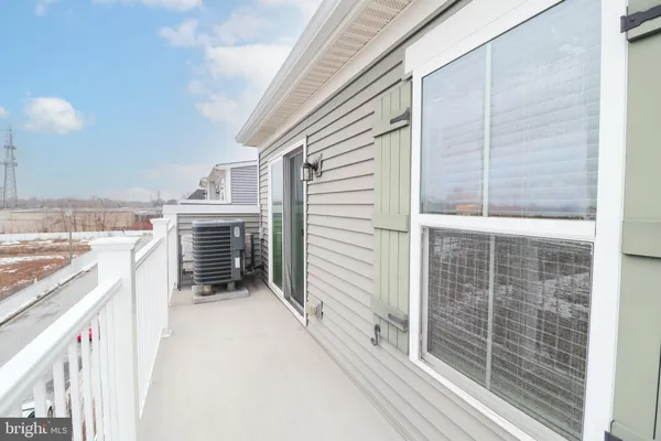 a view of a balcony with an outdoor space