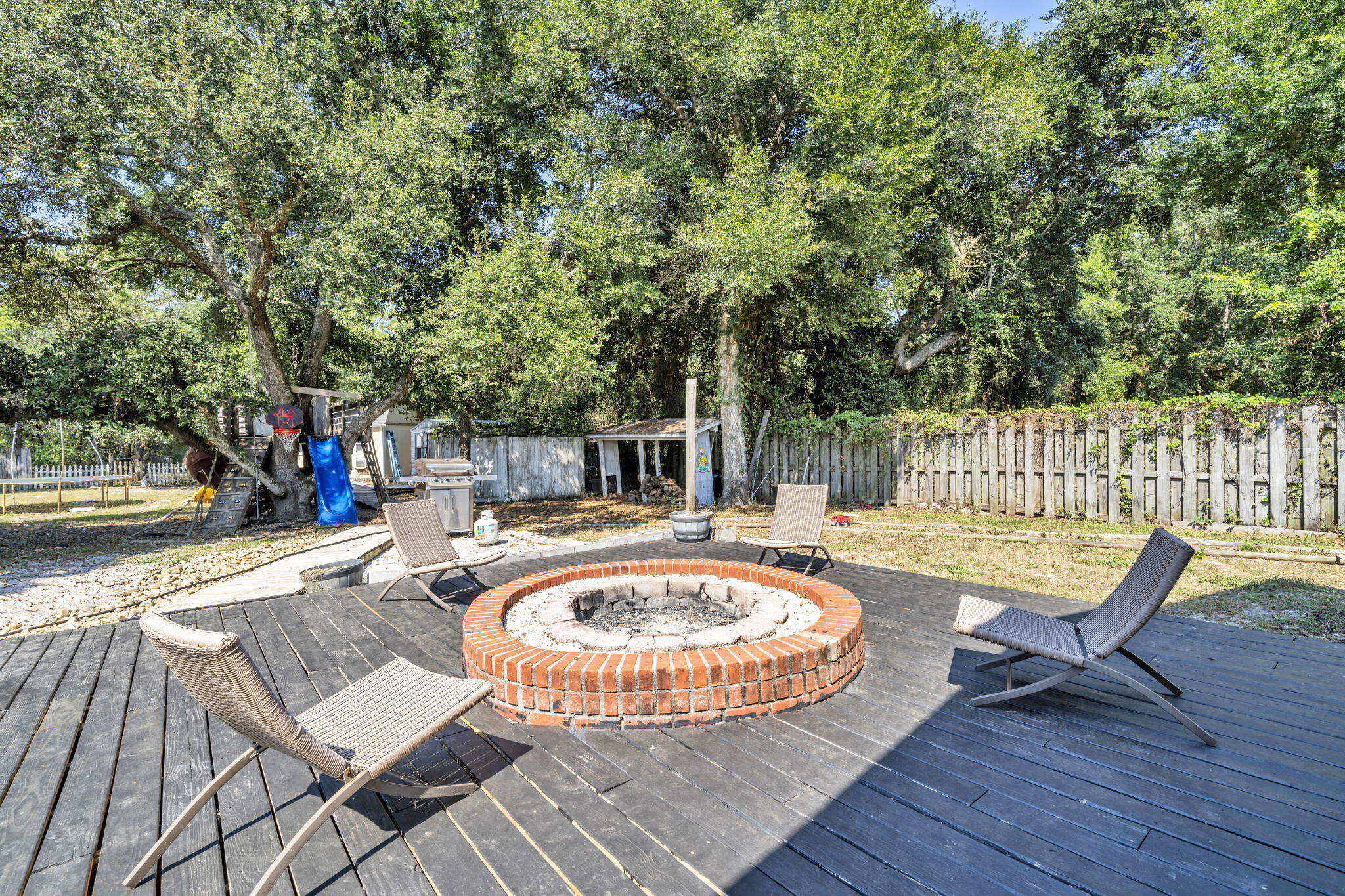 1871 Abercrombie Road Gulf Breeze, FL 32563 - Photo 23 of 32 Deck and firepit