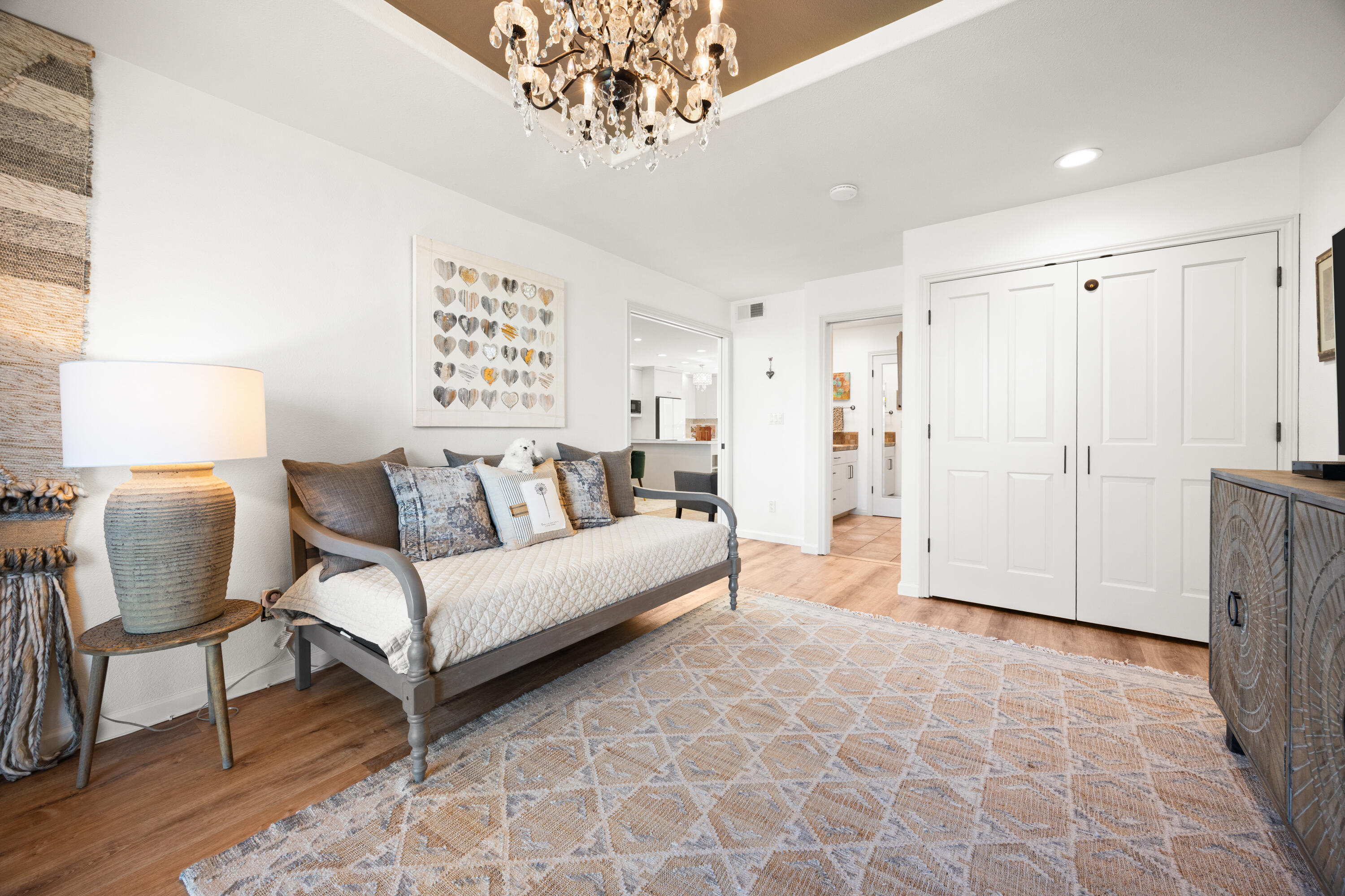 53 Marbella Drive Rancho Mirage, CA 92270 - Photo 14 of 45 a living room with furniture and a chandelier