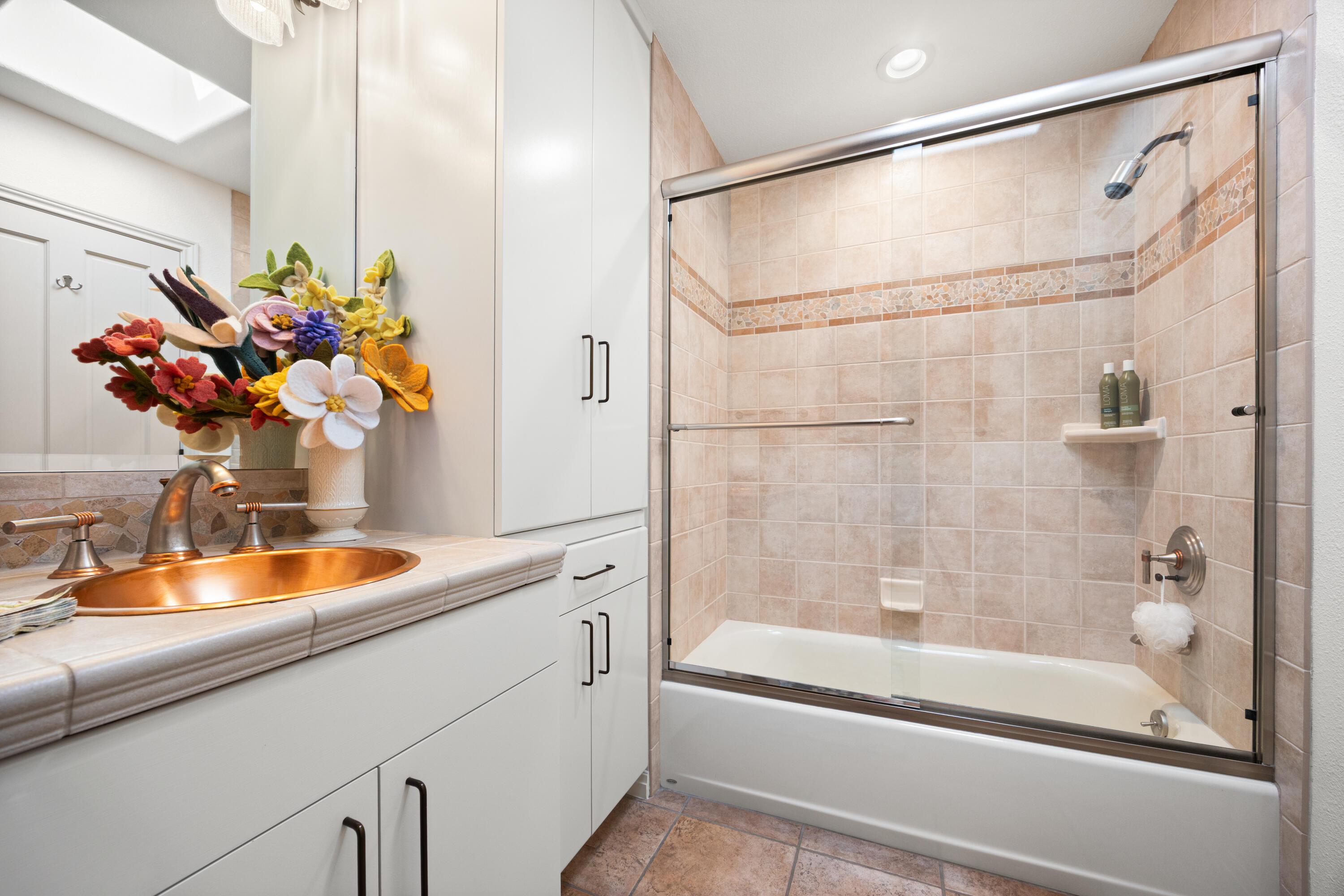 53 Marbella Drive Rancho Mirage, CA 92270 - Photo 16 of 45 a bathroom with a sink and a mirror