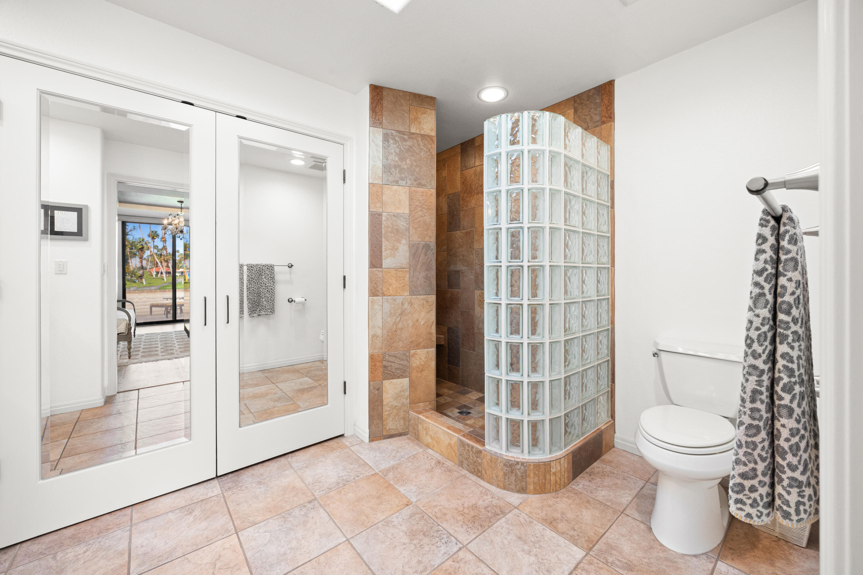 53 Marbella Drive Rancho Mirage, CA 92270 - Photo 18 of 45 a bathroom with a shower and a toilet