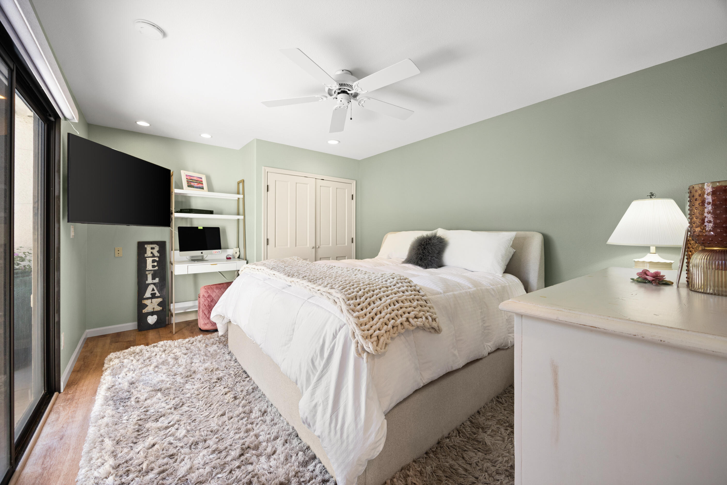 53 Marbella Drive Rancho Mirage, CA 92270 - Photo 19 of 45 a bedroom with two beds and a flat screen tv