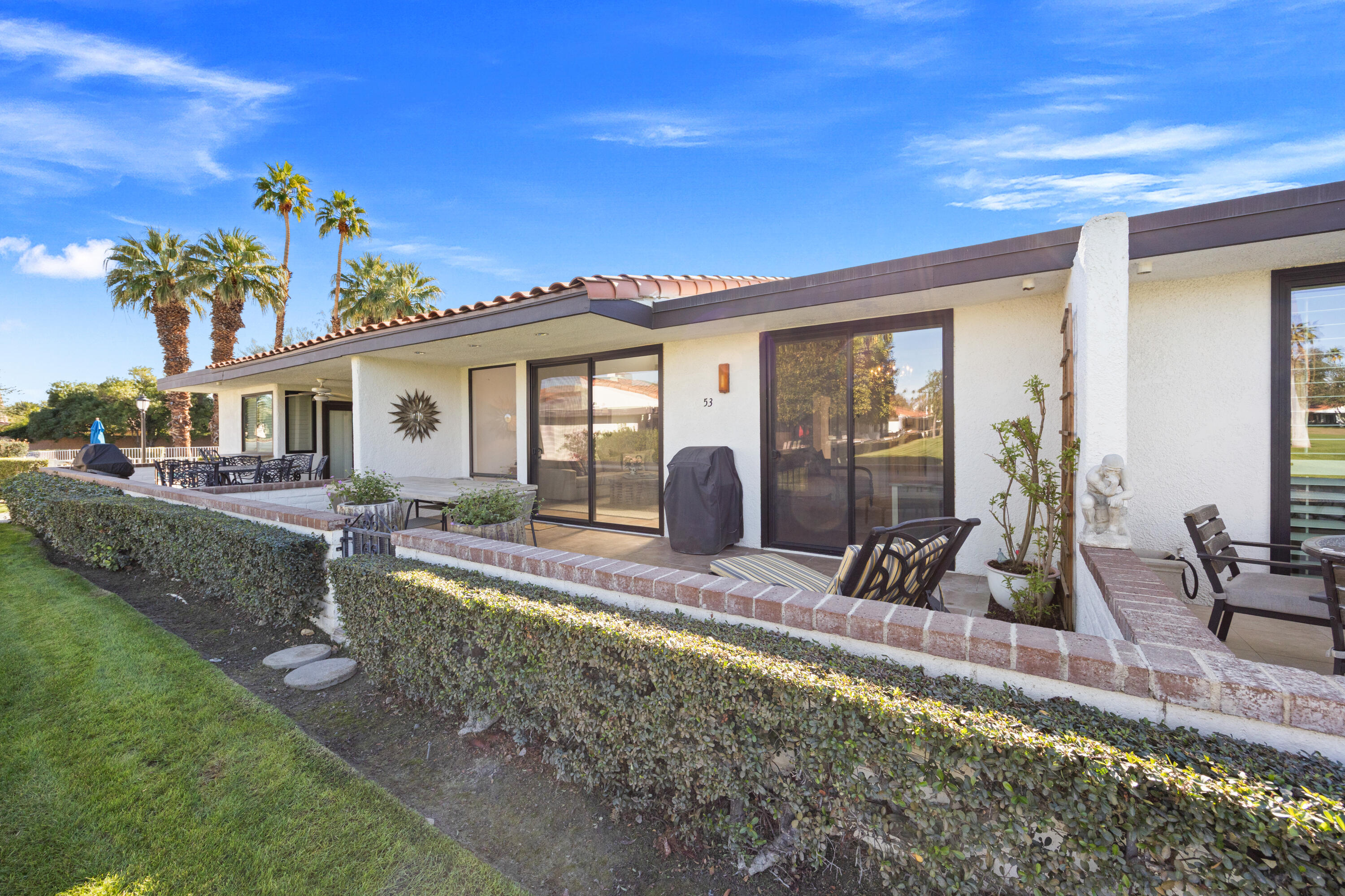 53 Marbella Drive Rancho Mirage, CA 92270 - Photo 32 of 45 a view of a house with backyard porch and sitting area