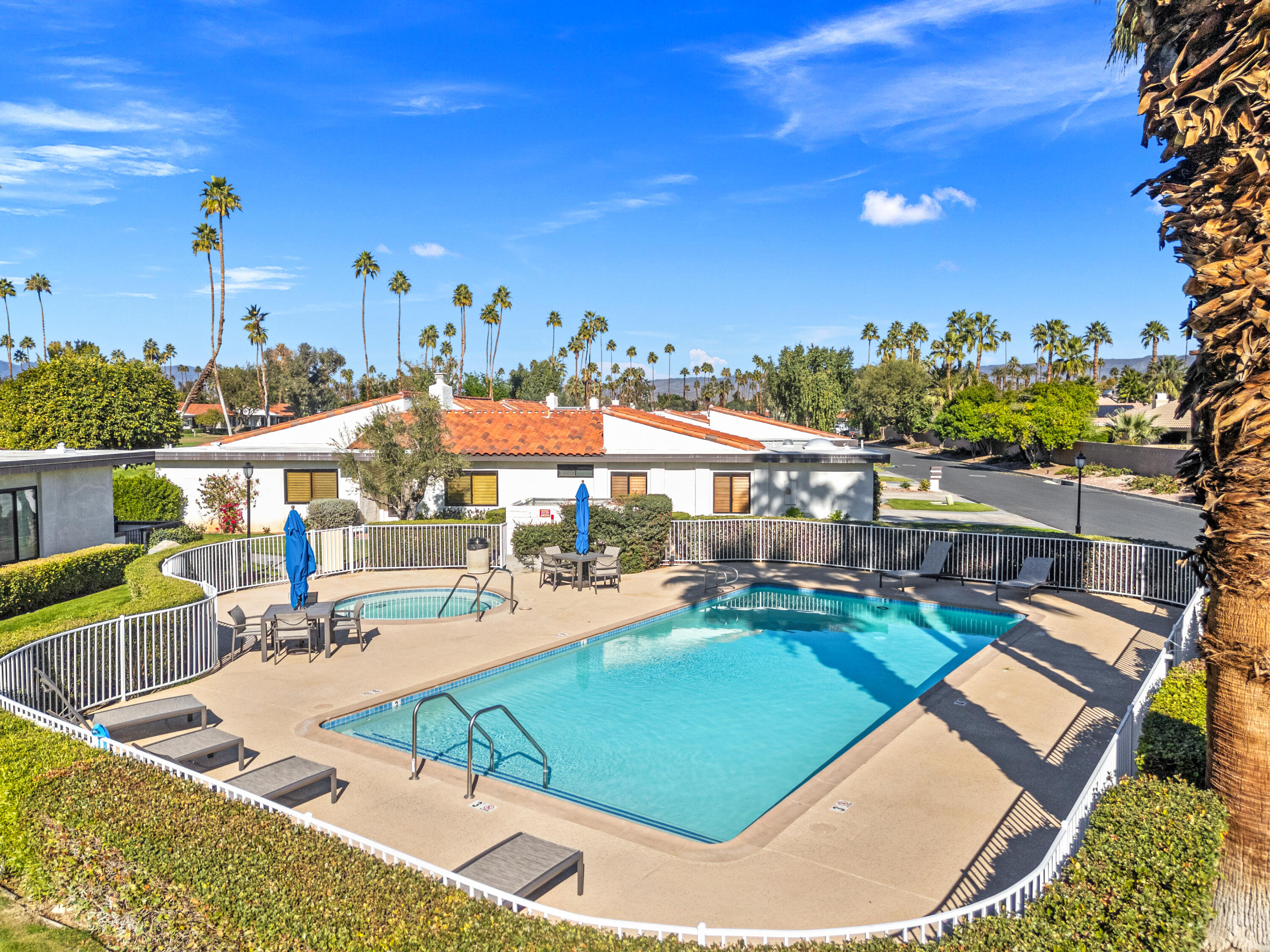 53 Marbella Drive Rancho Mirage, CA 92270 - Photo 41 of 45 a view of a swimming pool with a patio