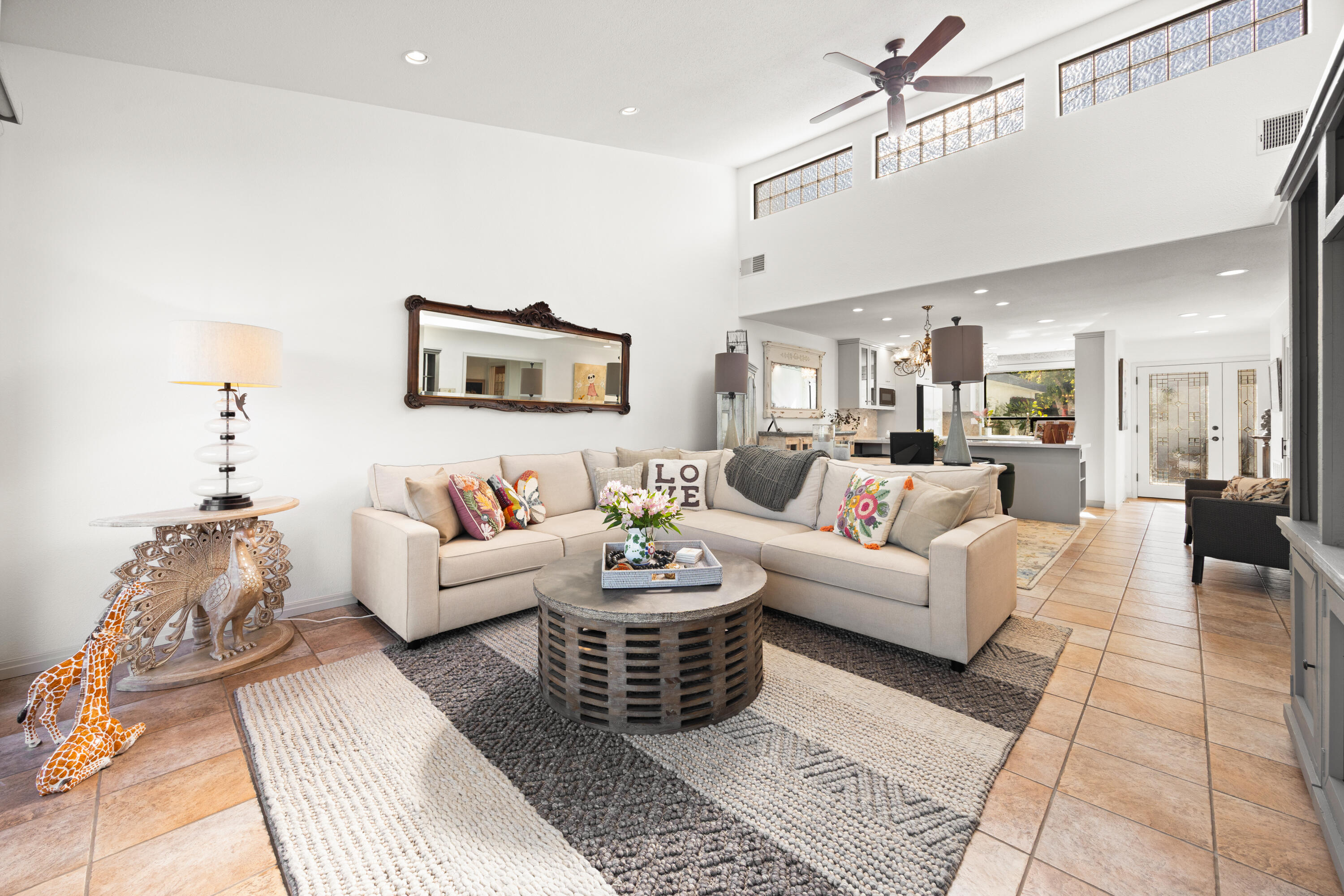 53 Marbella Drive Rancho Mirage, CA 92270 - Photo 6 of 45 a living room with furniture and a view of kitchen