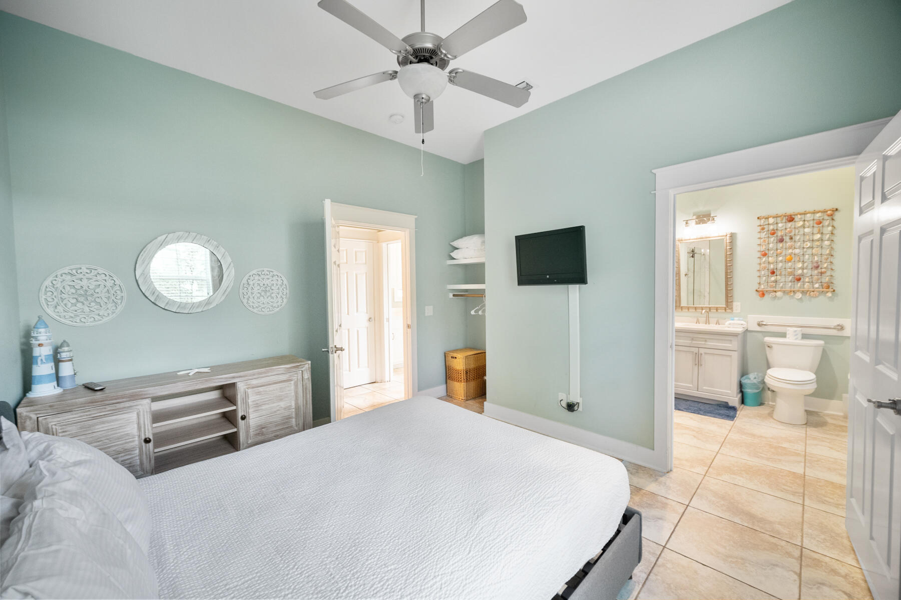 56 Dune Ridge Road Santa Rosa Beach, FL 32459 - Photo 20 of 65 a bedroom with a bed and wooden floor