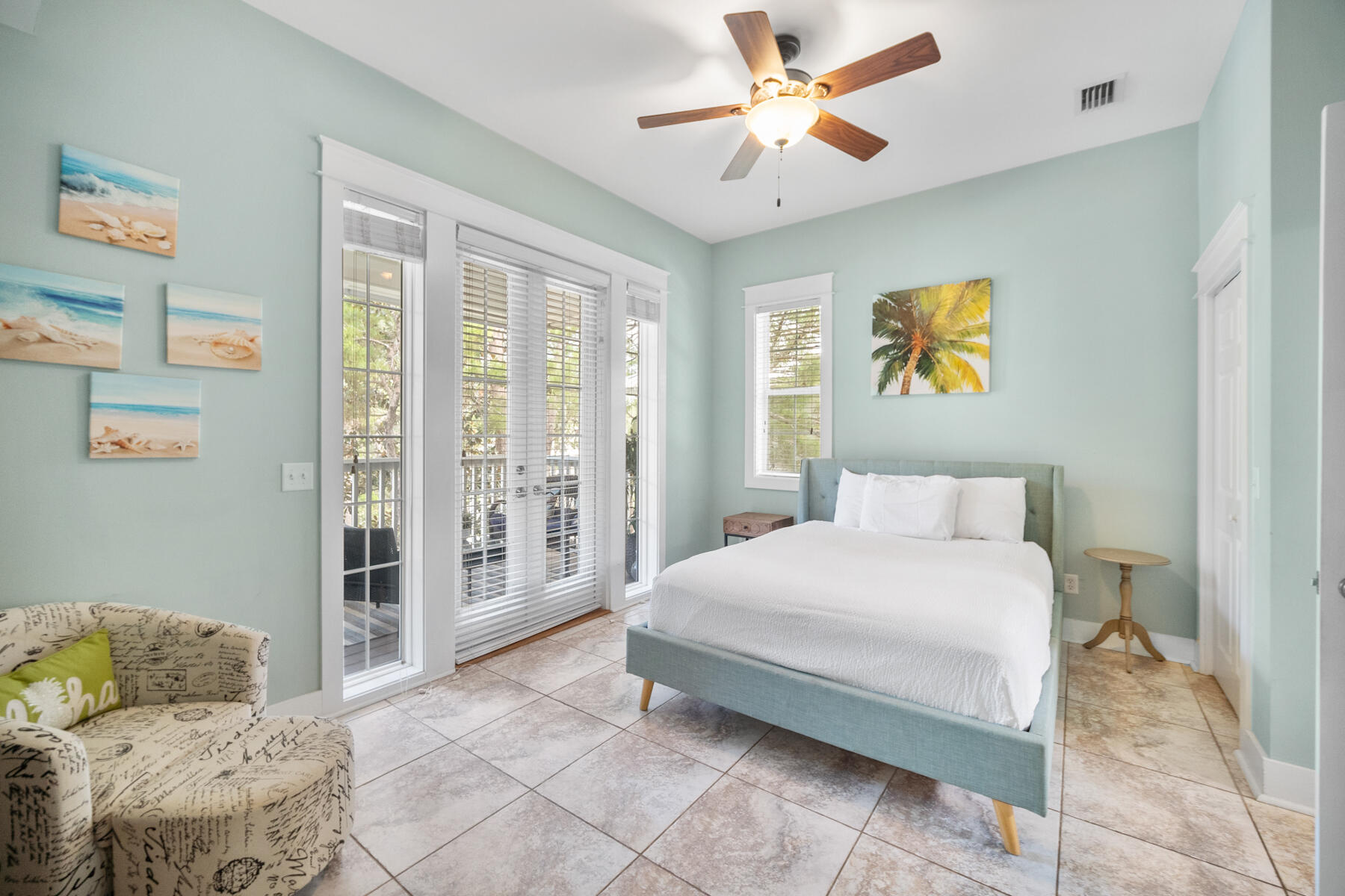 56 Dune Ridge Road Santa Rosa Beach, FL 32459 - Photo 27 of 65 a bedroom with a bed painting on wall and a large window