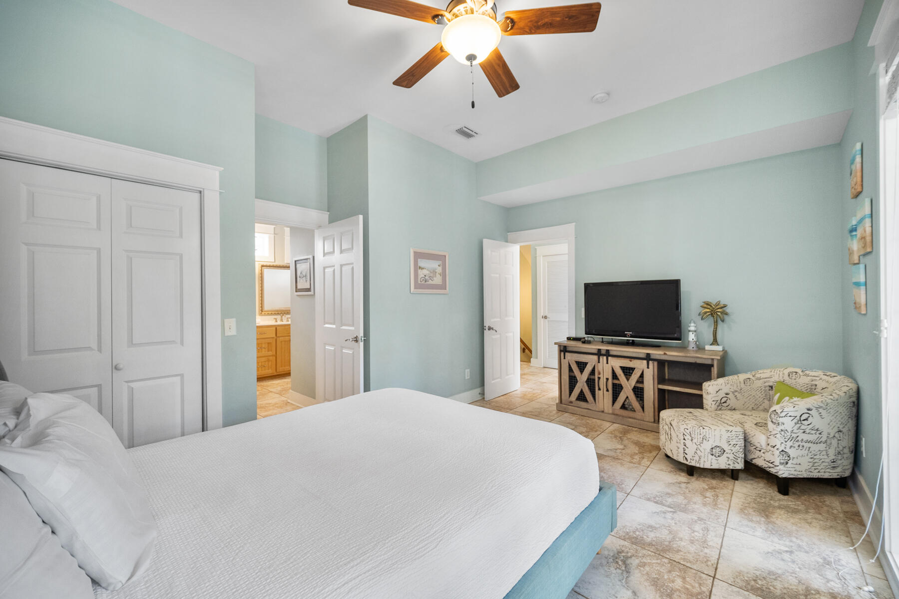 56 Dune Ridge Road Santa Rosa Beach, FL 32459 - Photo 28 of 65 a bedroom with bed and chair