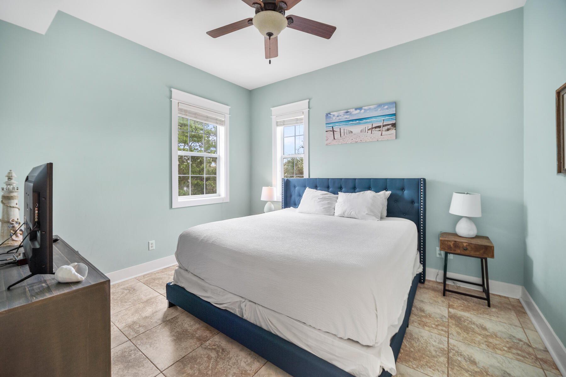 56 Dune Ridge Road Santa Rosa Beach, FL 32459 - Photo 42 of 65 a bedroom with a bed and a flat screen tv