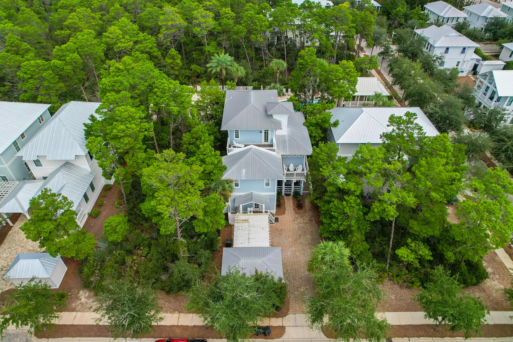 56 Dune Ridge Road Santa Rosa Beach, FL 32459 - Photo 5 of 65 an aerial view of a house with garden space and street view