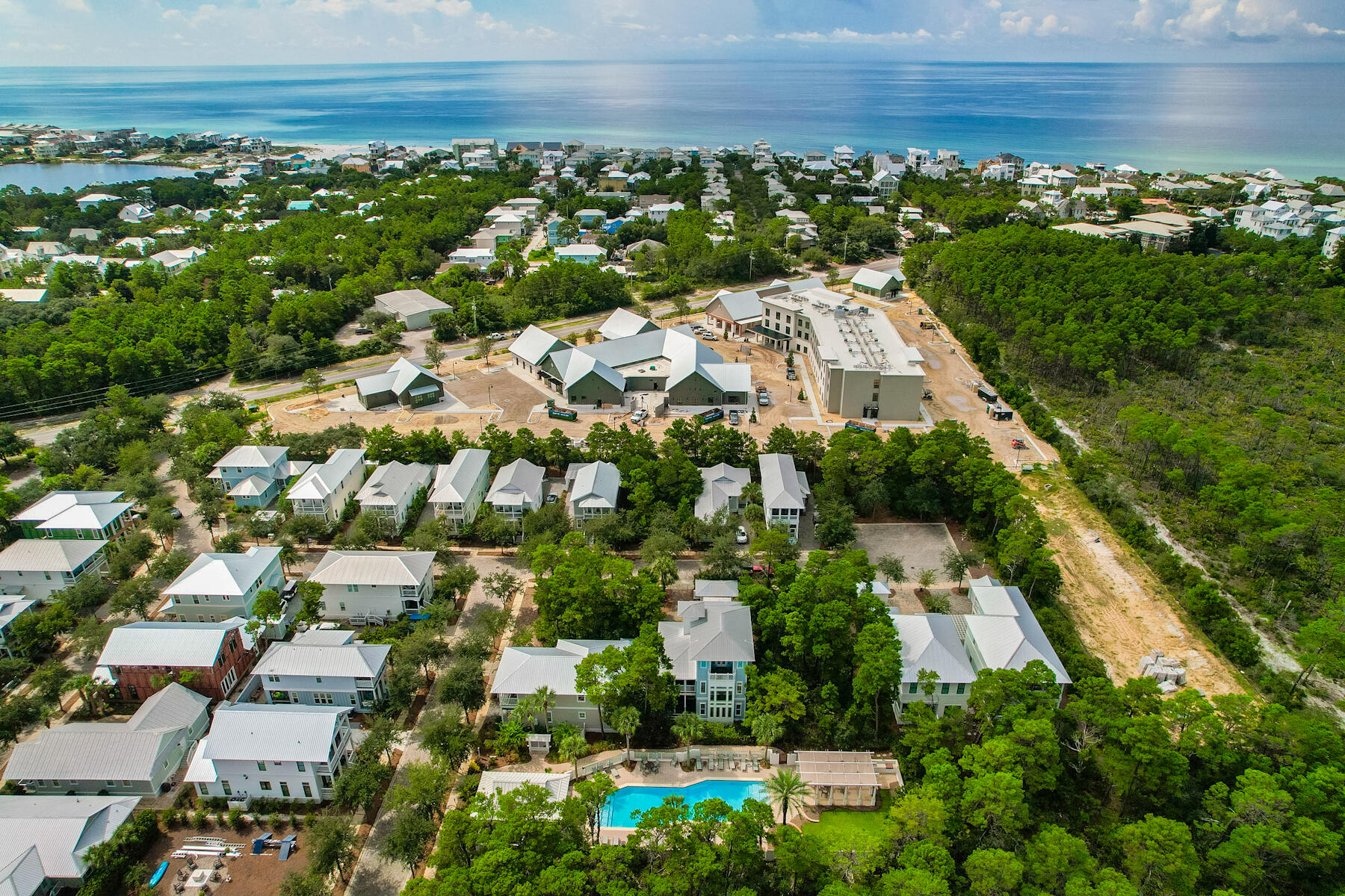 56 Dune Ridge Road Santa Rosa Beach, FL 32459 - Photo 61 of 65 an aerial view of residential houses with outdoor space and trees