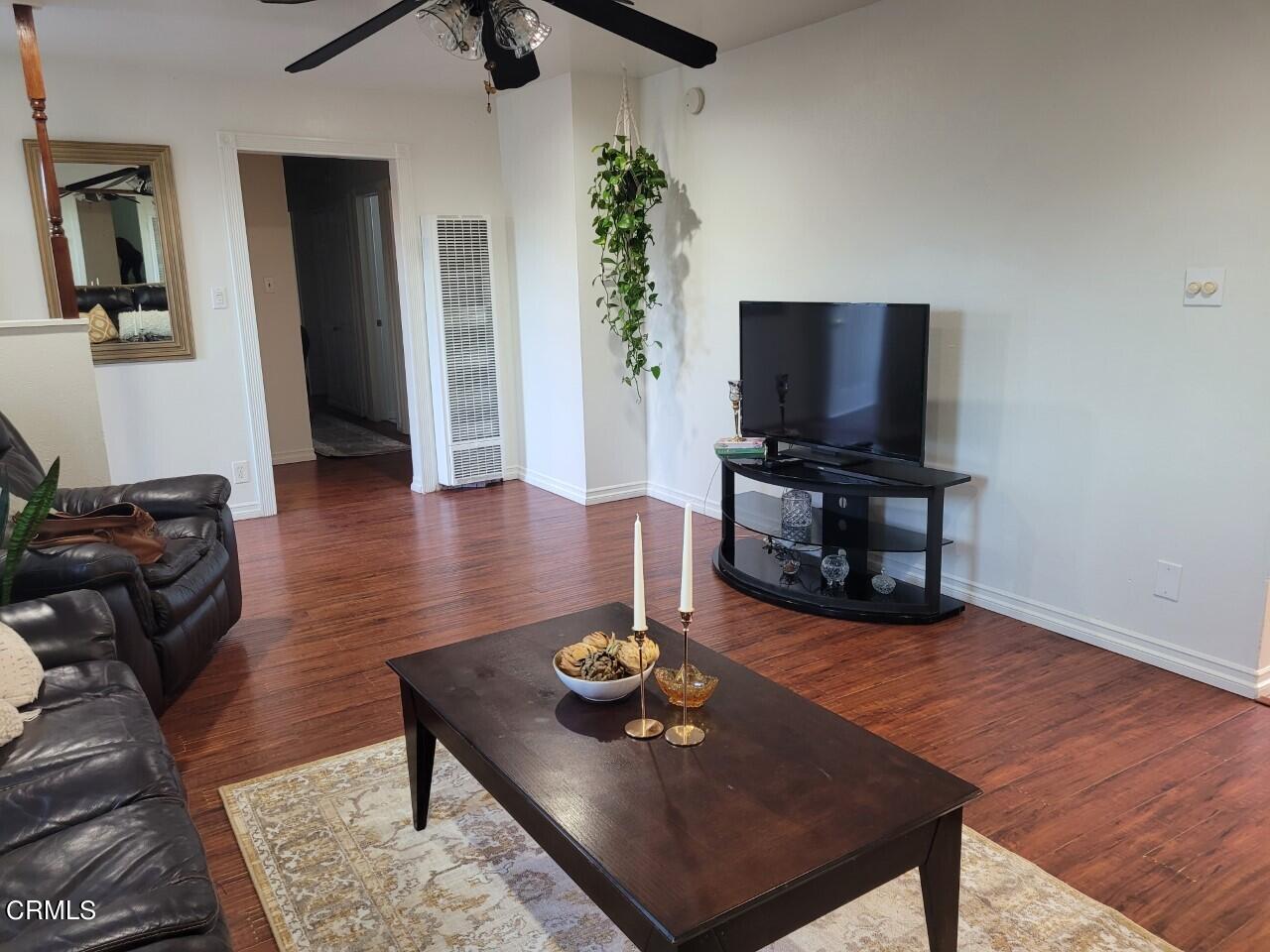 521 West Bard Road Oxnard, CA 93033 - Photo 3 of 19 a living room with furniture and a flat screen tv