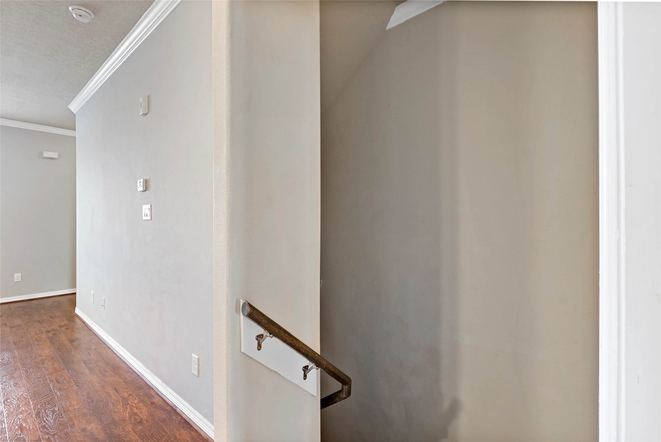 1198 Jones-Butler Road, Unit 1402 College Station, TX 77840 - Photo 12 of 21 a view of a hallway with wooden floor