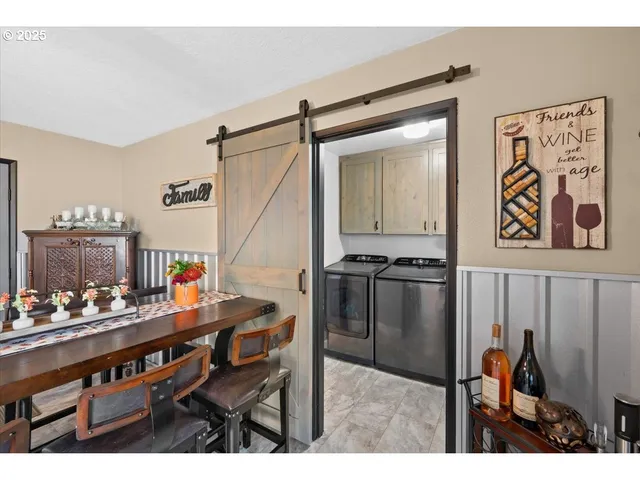 a view of a dining room with furniture