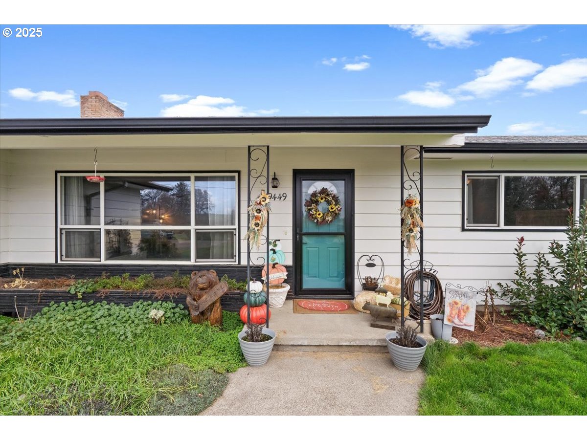 39449 Northwest Wilkesboro Road Banks, OR 97106 - Photo 3 of 45 a front view of a house with a yard