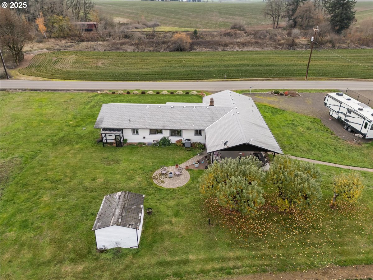 39449 Northwest Wilkesboro Road Banks, OR 97106 - Photo 41 of 45 a backyard of a house with table and chairs