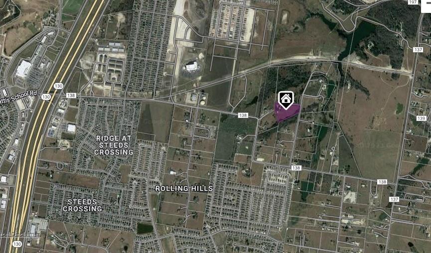 333 Spring Valley Street Hutto, TX 78634 - Photo 12 of 19 a bathroom with a shower