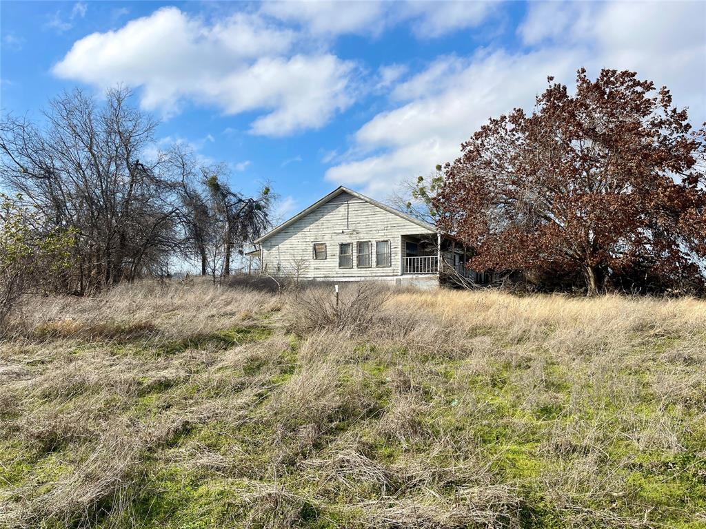 333 Spring Valley Street Hutto, TX 78634 - Photo 3 of 19 a view of house with a yard