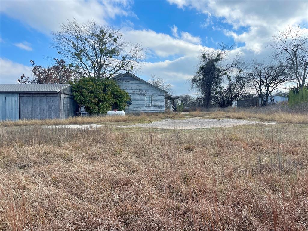 333 Spring Valley Street Hutto, TX 78634 - Photo 4 of 19 a view of a yard with a house