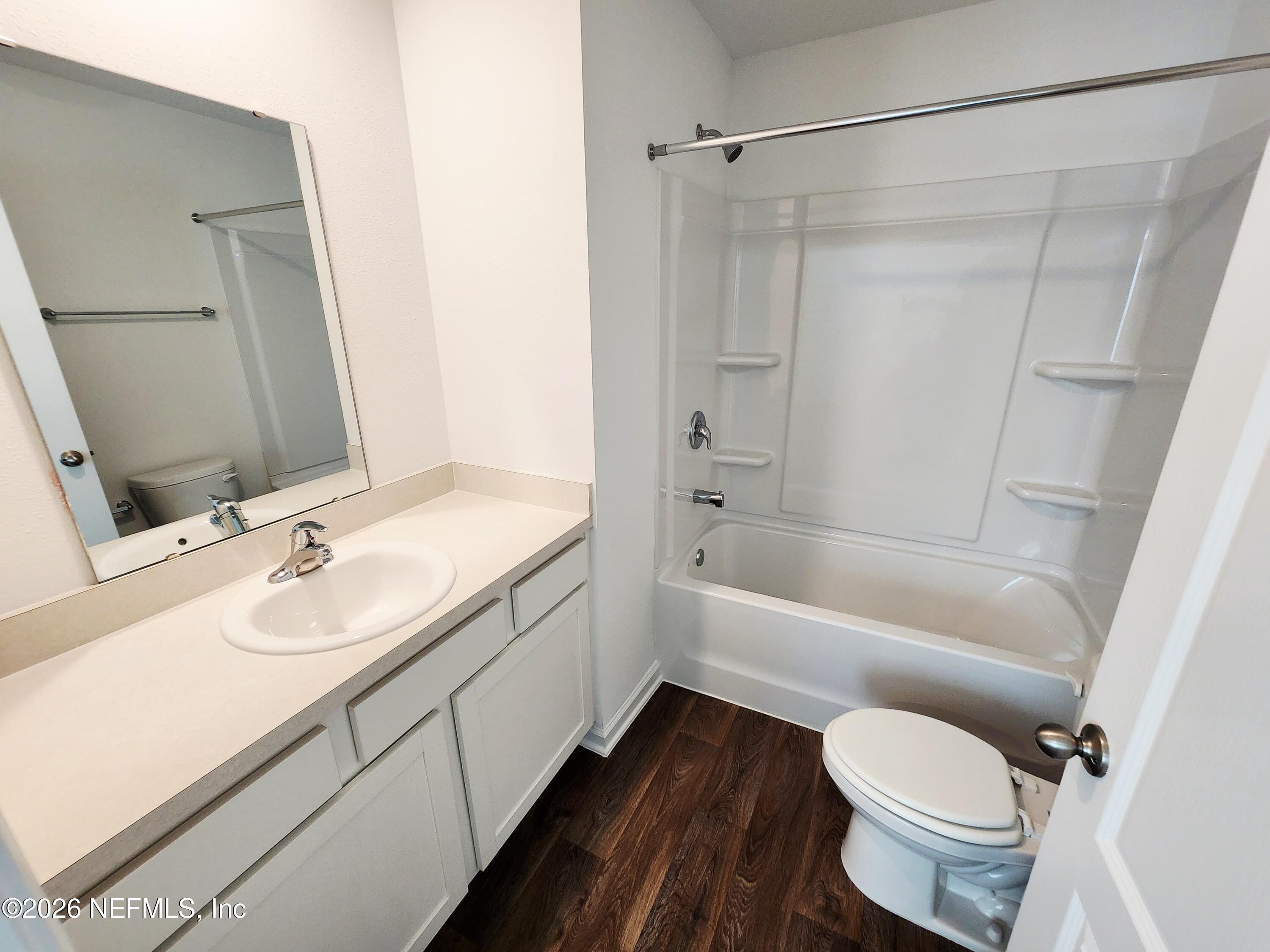 51 Palmetto Rdg Road St. Augustine, FL 32095 - Photo 15 of 16 a bathroom with a sink toilet bathtub and vanity