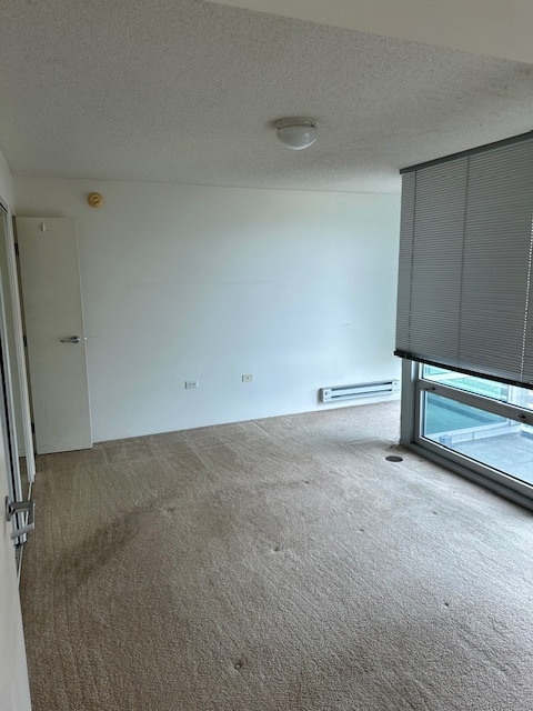 800 Elgin Road, Unit 1414 Evanston, IL 60201 - Photo 5 of 9 a view of an empty room