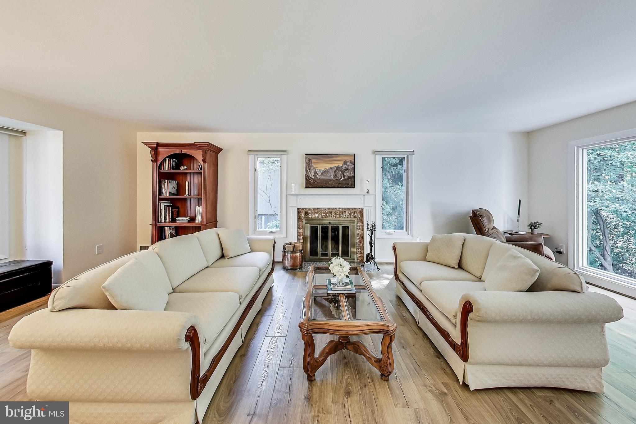 2452 Freetown Drive Reston, VA 20191 - Photo 5 of 69 Formal Living Room with Wood Burning Fireplace
