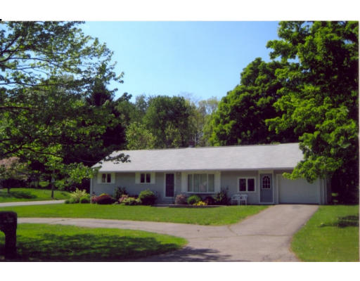 135 Mountain Road Holyoke, MA 01040 - Photo 1 of 1 a front view of a house with a garden
