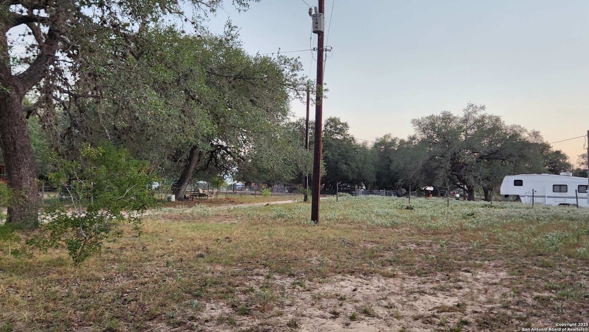 0 Hardy Road Elmendorf, TX 78112 - Photo 22 of 27 a backyard of a house and trees