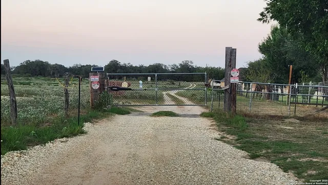 a view of a lake with a yard