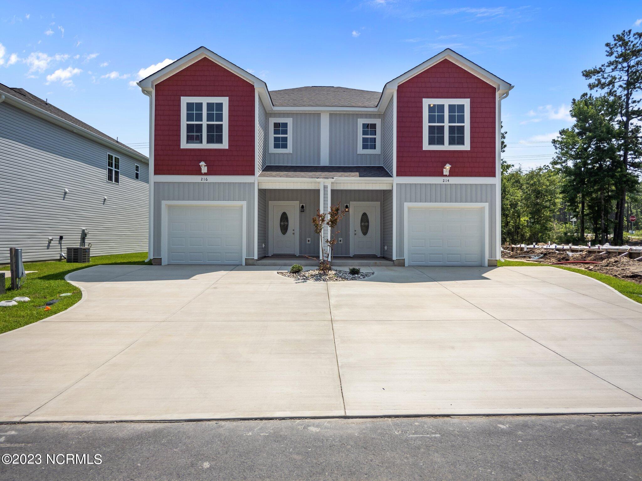 216 Holly Street Holly Ridge, NC 28445 - Photo 1 of 47 216 Holly Sands Loop