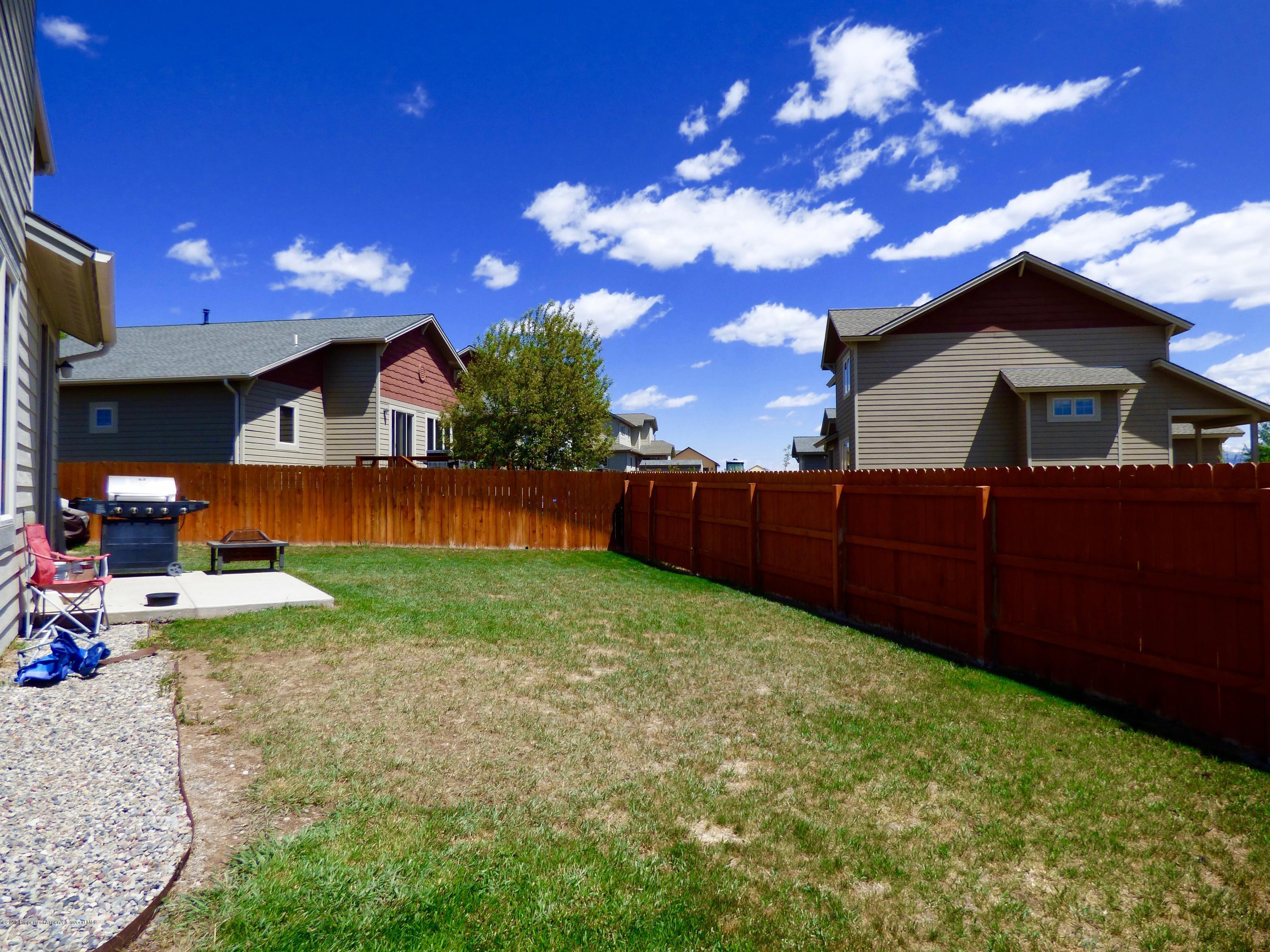 1911 Promontory Circle Rifle, CO 81650 - Photo 20 of 22 Spacious Back yard