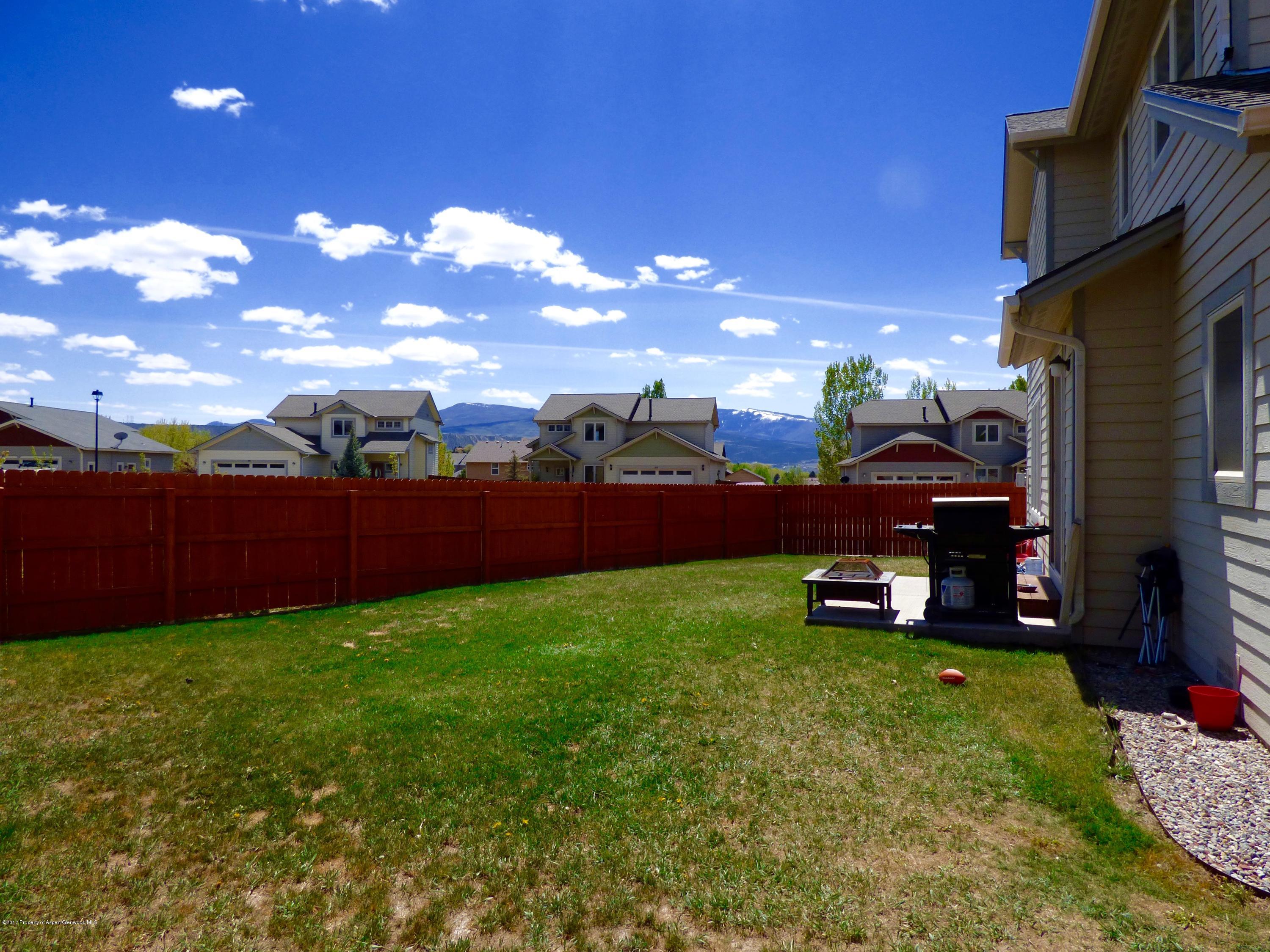 1911 Promontory Circle Rifle, CO 81650 - Photo 21 of 22 Back yard with views
