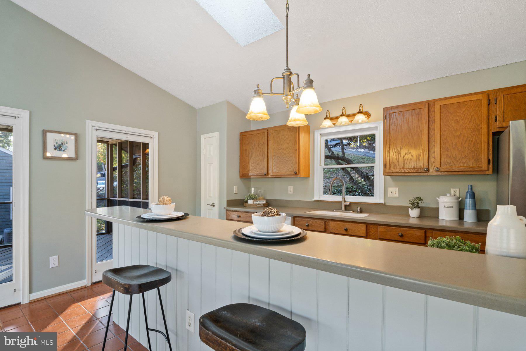 6949 Meadowlake Road New Market, MD 21774 - Photo 14 of 51 Counter gives more space for sitting.