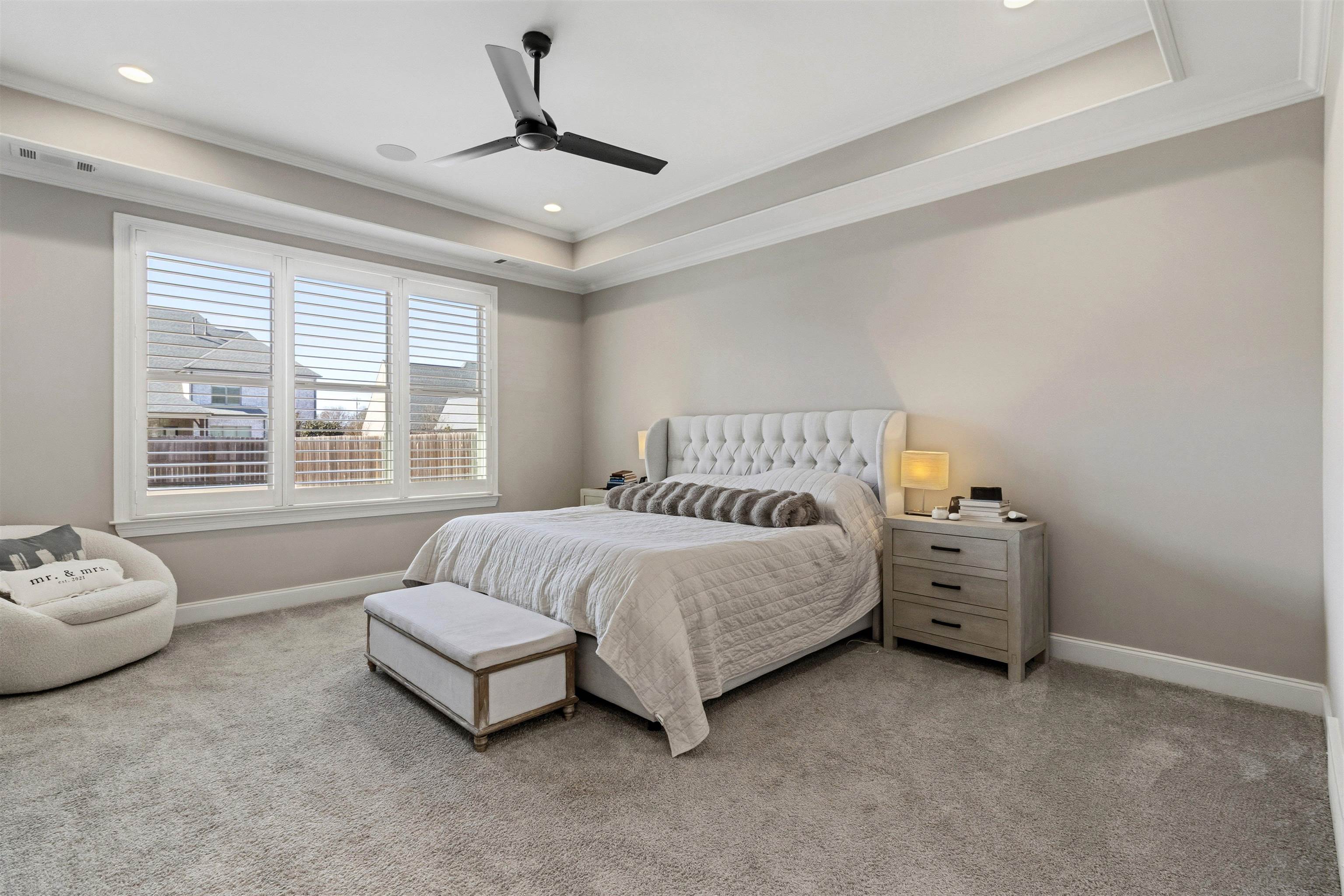 4757 Carousel Lane Collierville, TN 38017 - Photo 16 of 39 Bedroom with carpet flooring, crown molding, a ceiling fan, recessed lighting, and a raised ceiling