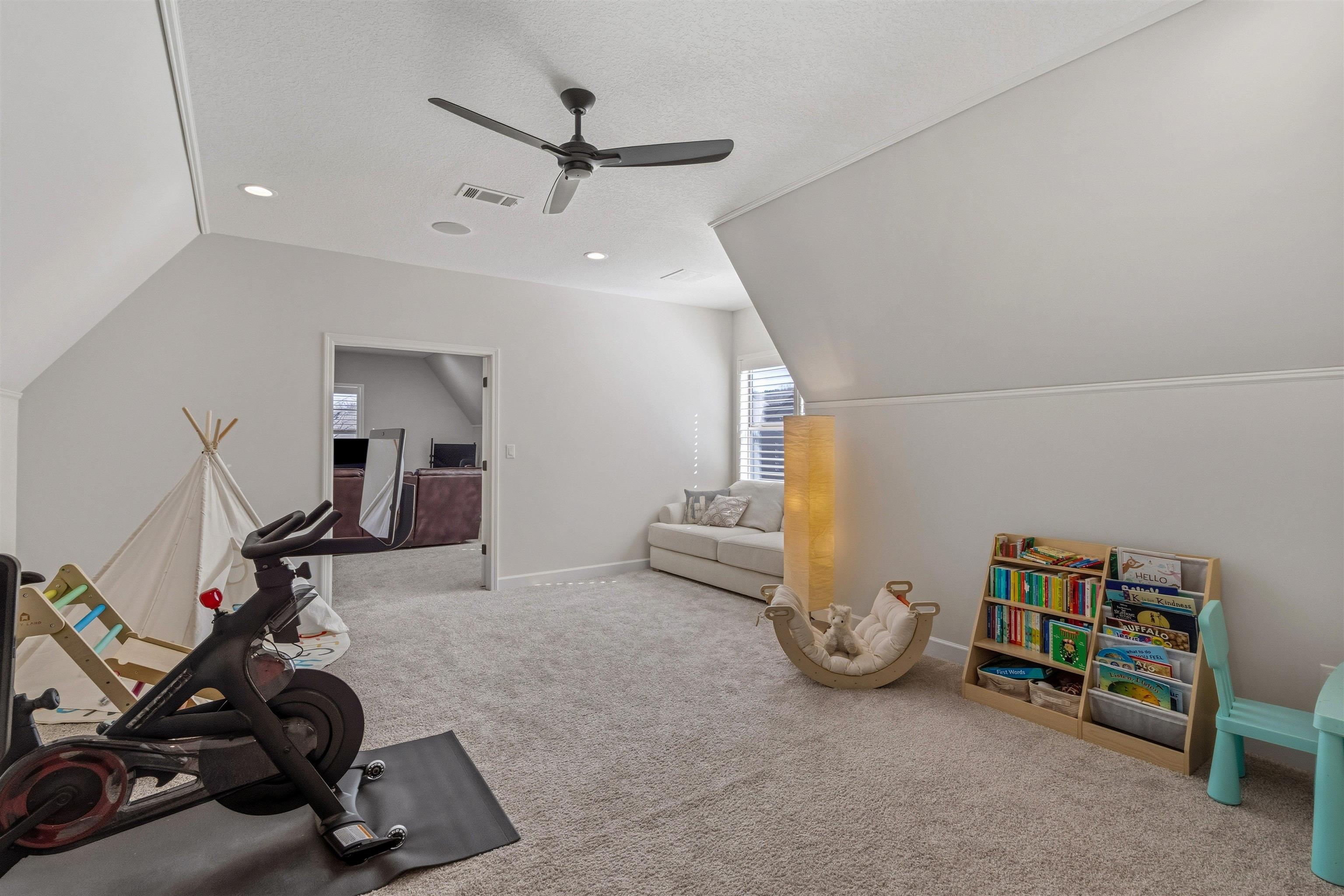 4757 Carousel Lane Collierville, TN 38017 - Photo 26 of 39 Exercise room with carpet and a ceiling fan