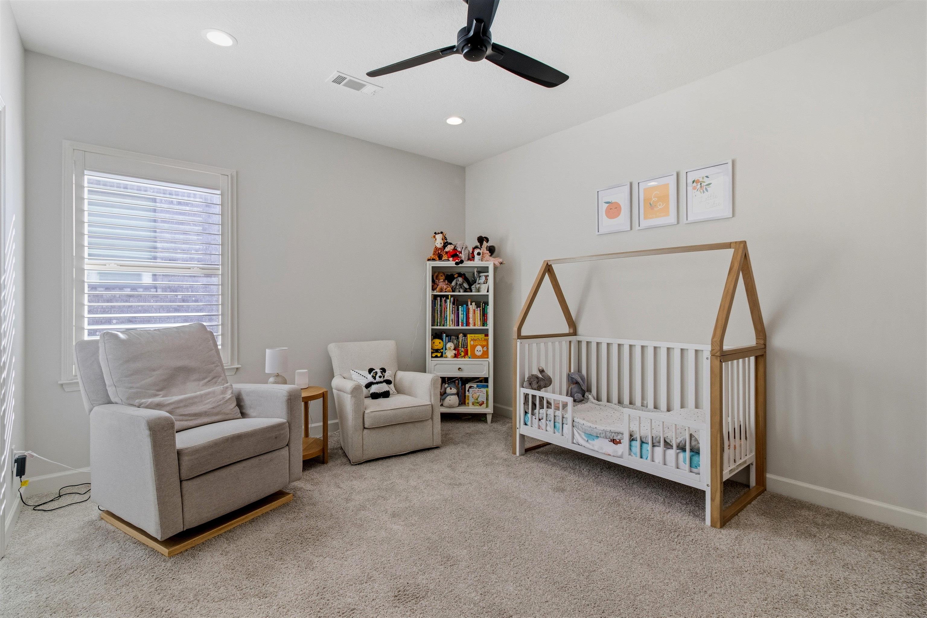 4757 Carousel Lane Collierville, TN 38017 - Photo 30 of 39 Bedroom with a crib, ceiling fan, light colored carpet, and recessed lighting