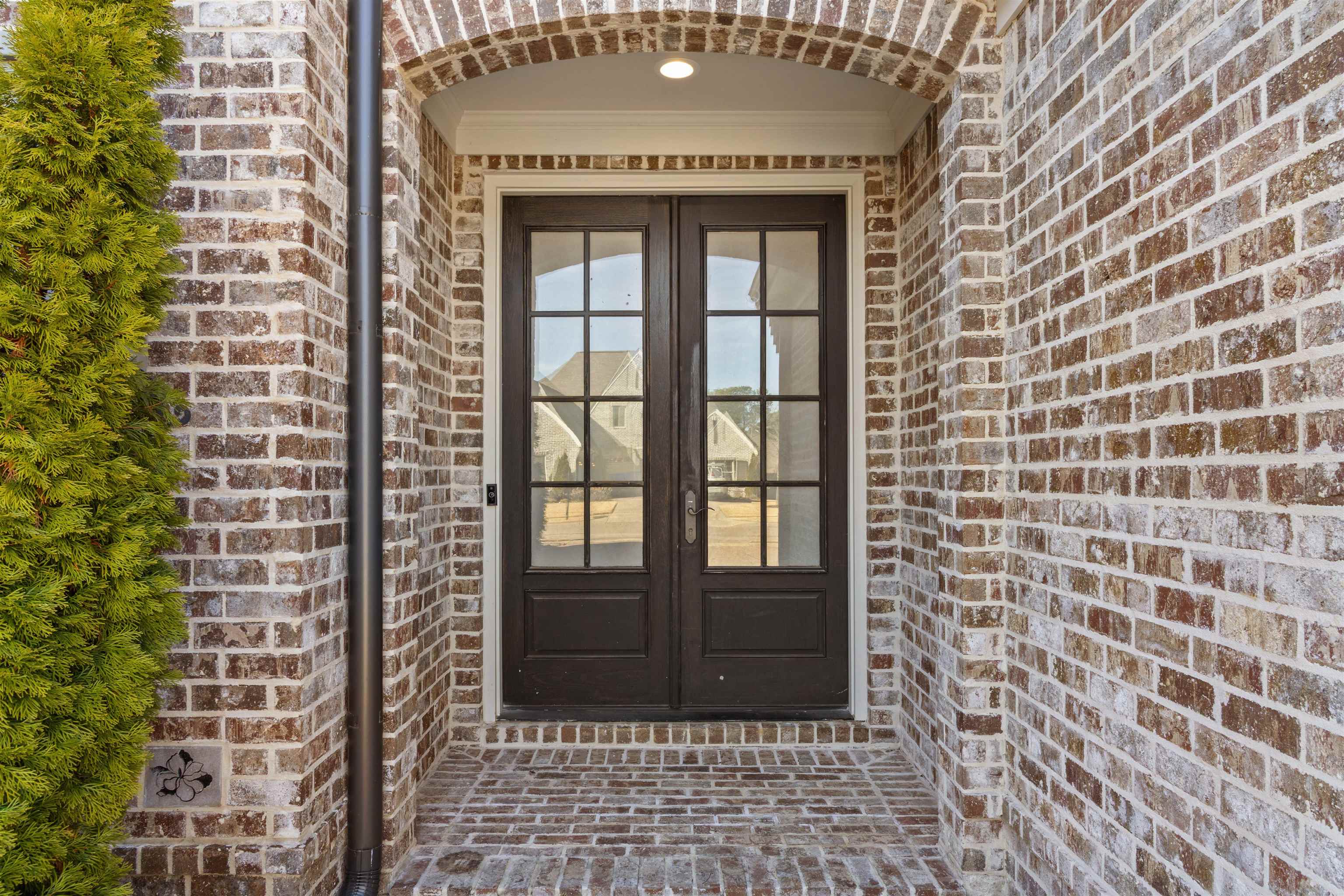 4757 Carousel Lane Collierville, TN 38017 - Photo 3 of 39 Entrance to property with french doors and brick siding