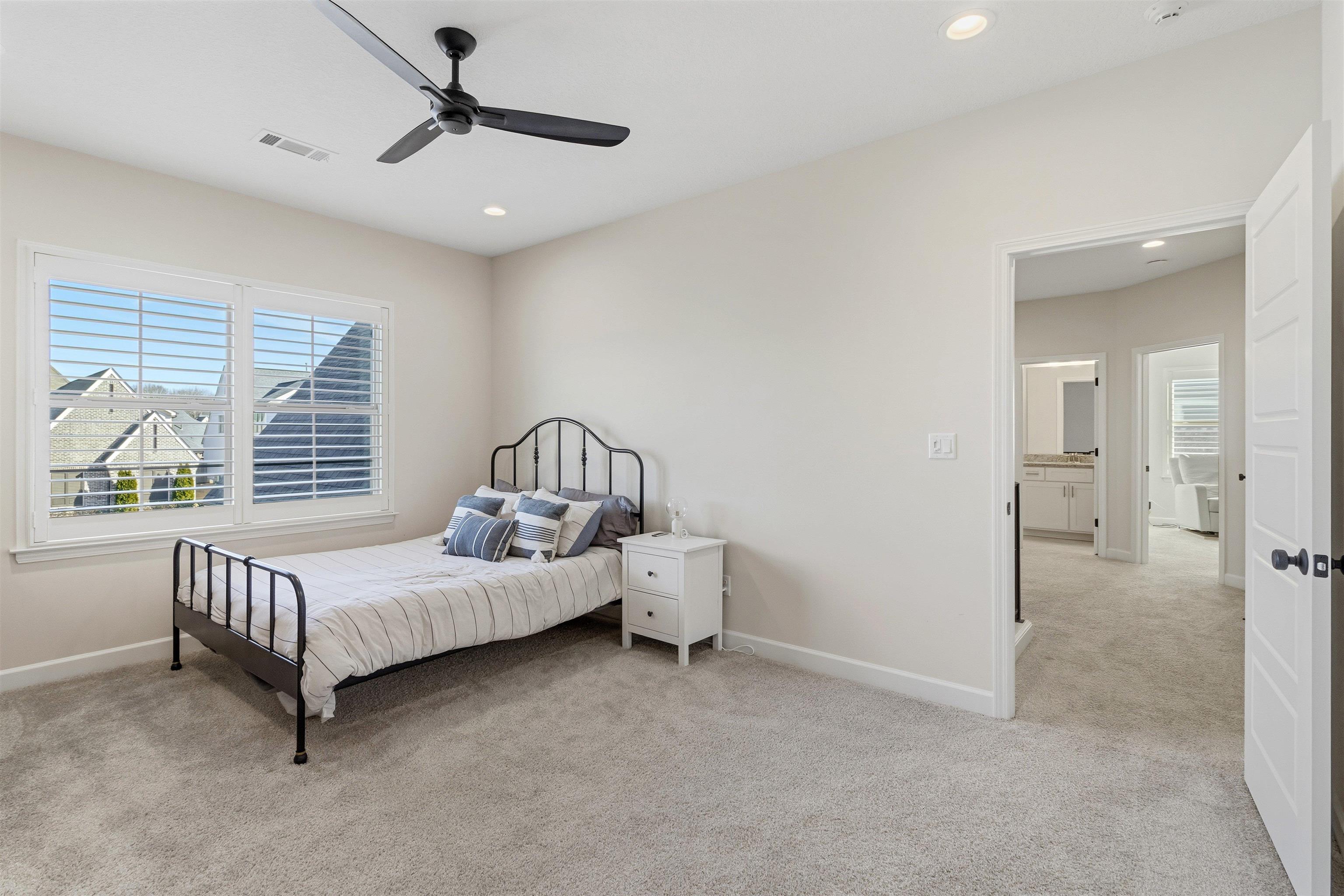 4757 Carousel Lane Collierville, TN 38017 - Photo 33 of 39 Bedroom with light colored carpet, a ceiling fan, and recessed lighting