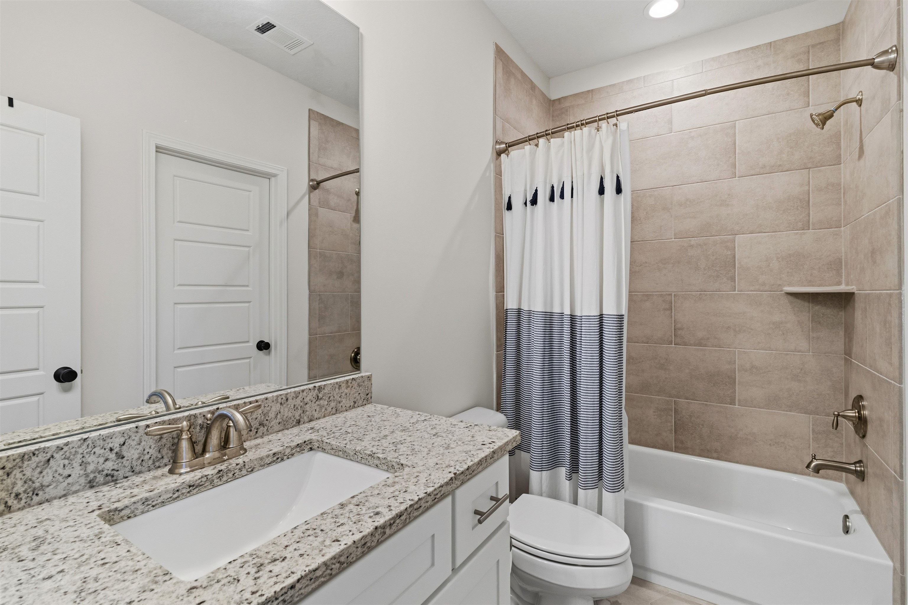 4757 Carousel Lane Collierville, TN 38017 - Photo 34 of 39 Full bath with shower / bath combo with shower curtain and vanity