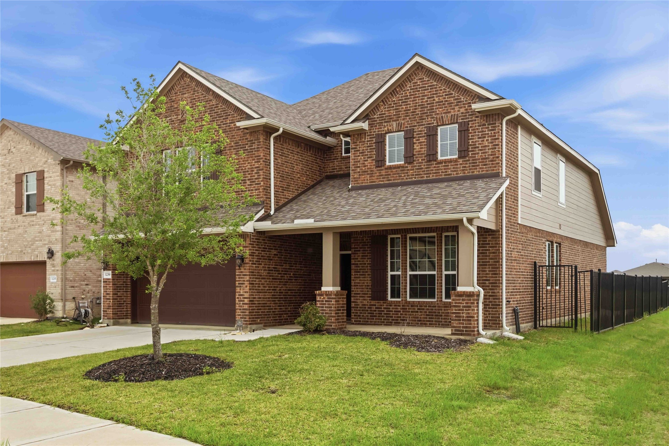 1239 Cascade Hls Drive Rosharon, TX 77583 - Photo 1 of 30 a front view of a house with a yard and garage