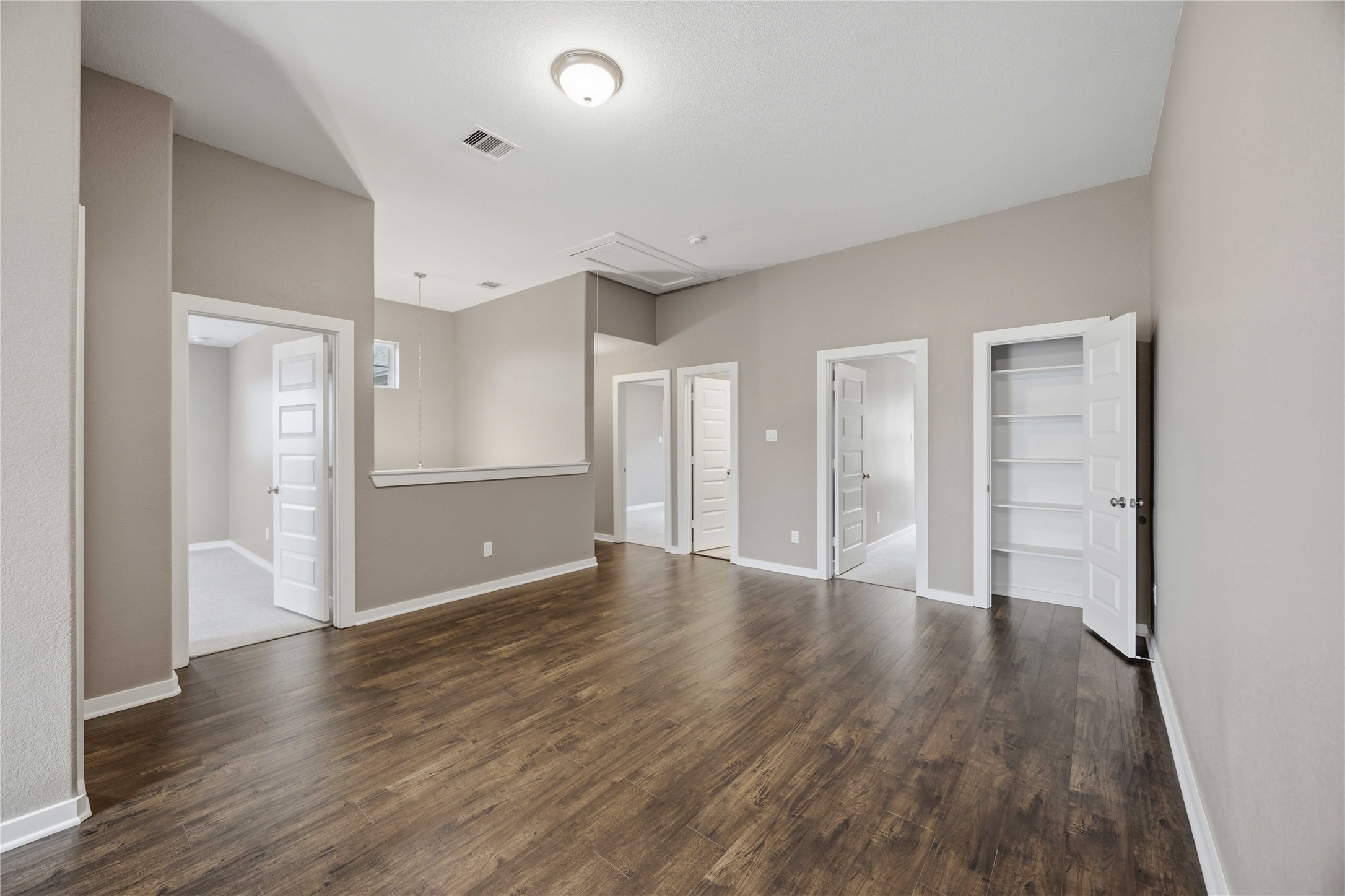 1239 Cascade Hls Drive Rosharon, TX 77583 - Photo 18 of 30 a view of an empty room with wooden floor