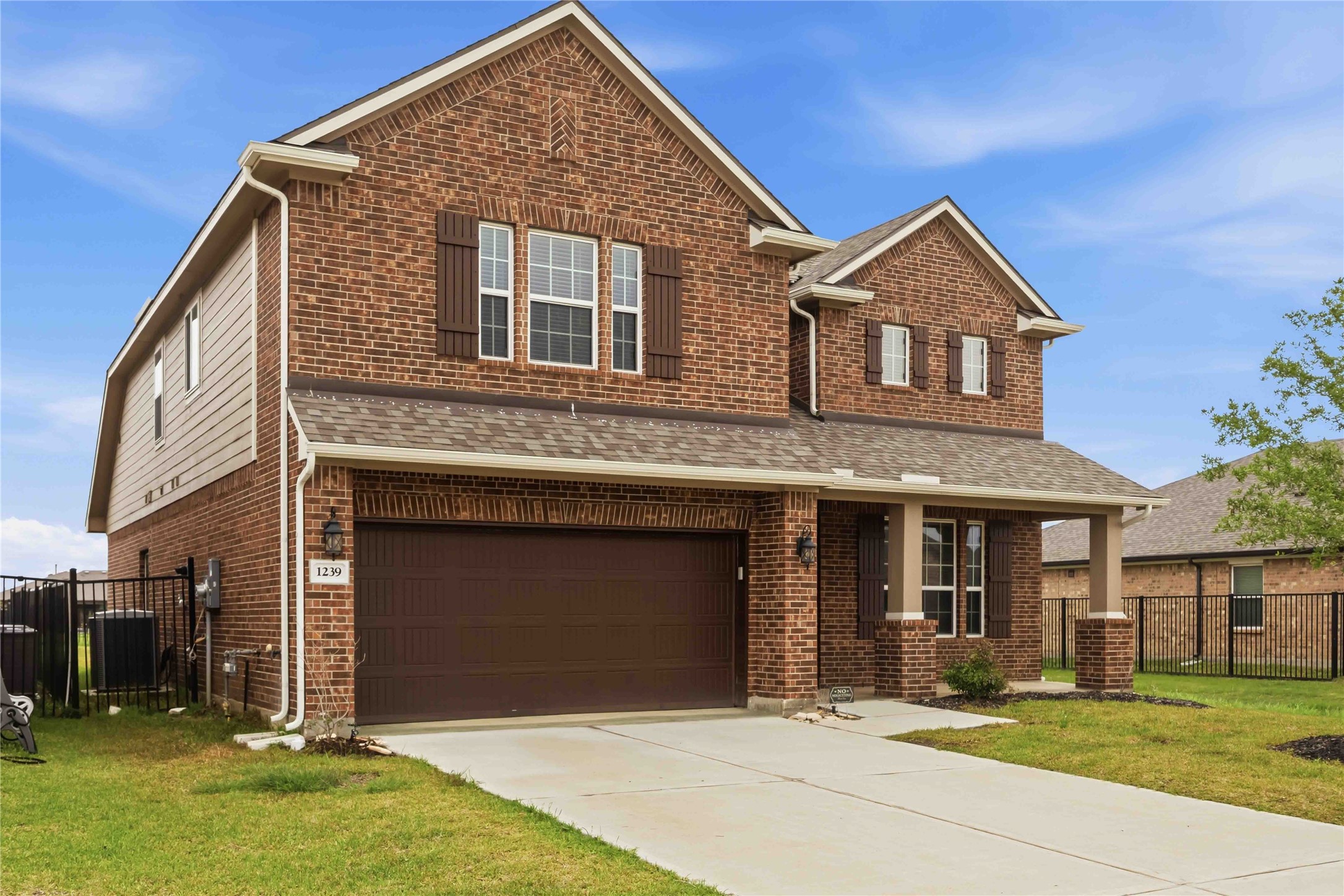 1239 Cascade Hls Drive Rosharon, TX 77583 - Photo 2 of 30 a front view of a house with a yard
