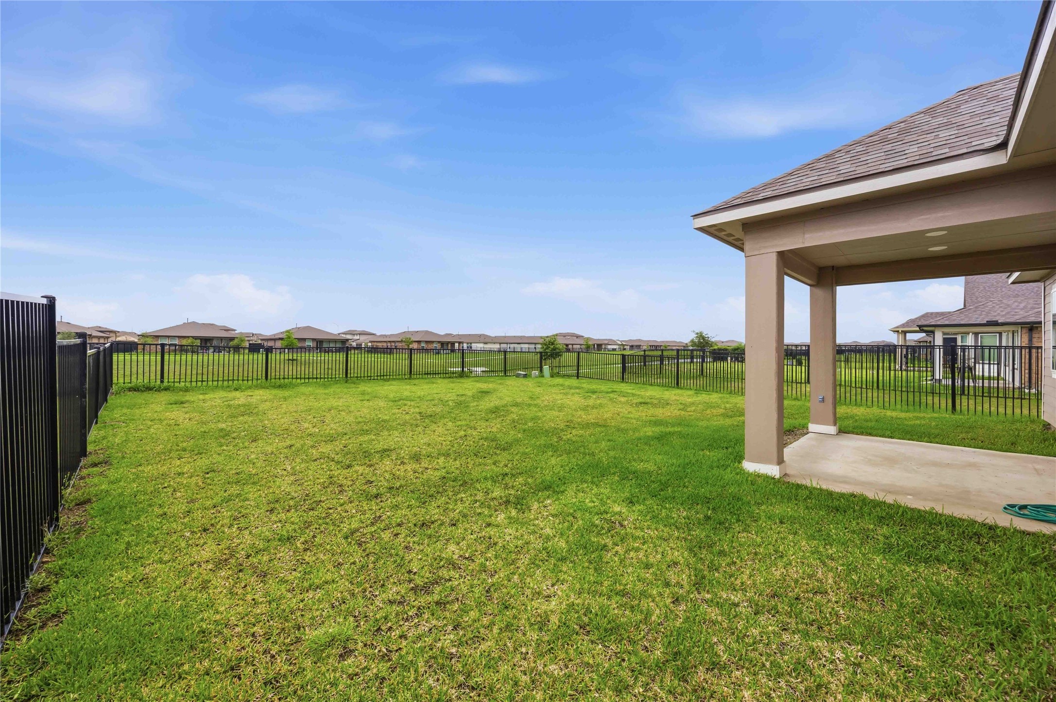 1239 Cascade Hls Drive Rosharon, TX 77583 - Photo 28 of 30 a view of building with yard