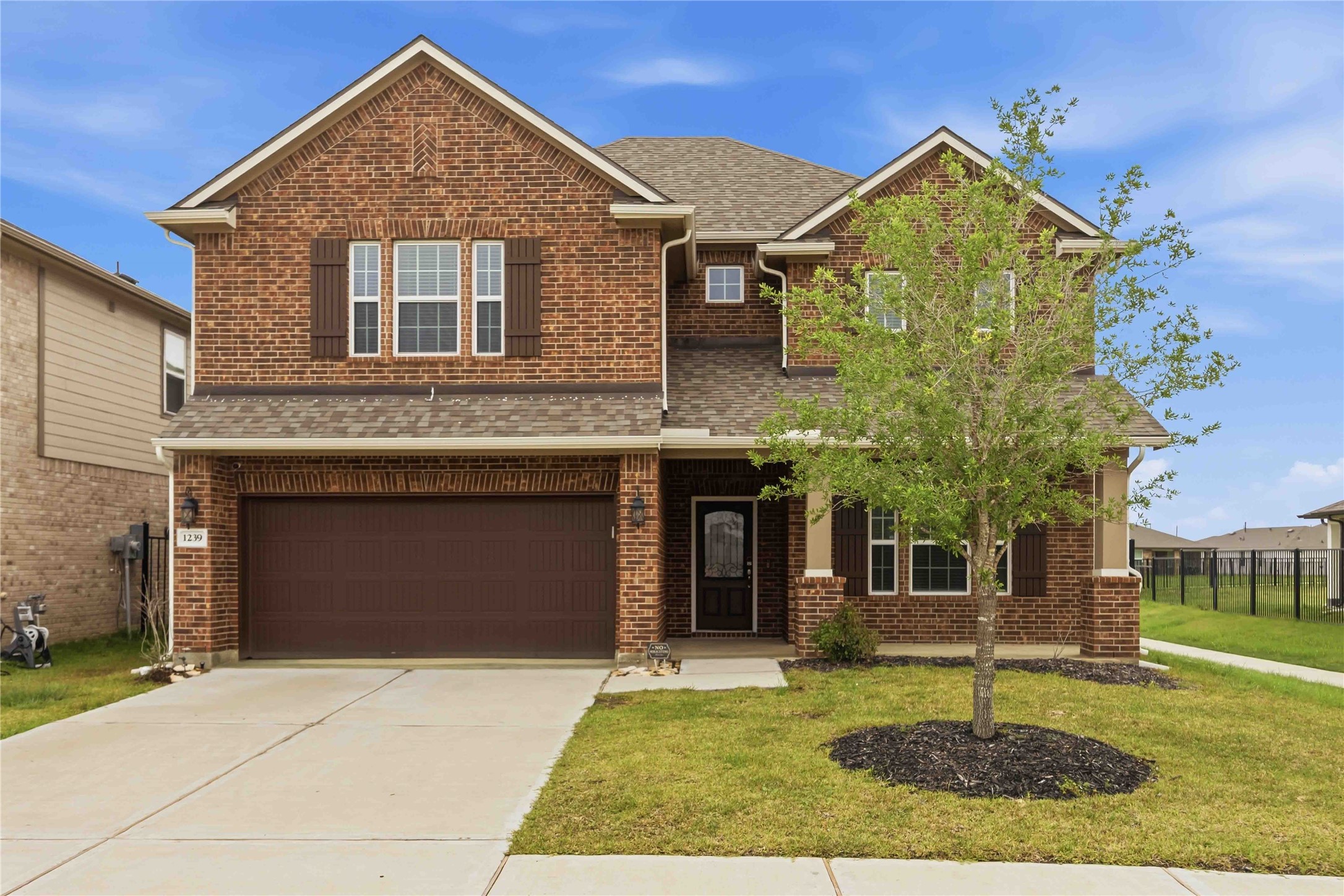 1239 Cascade Hls Drive Rosharon, TX 77583 - Photo 3 of 30 front view of a house with a yard