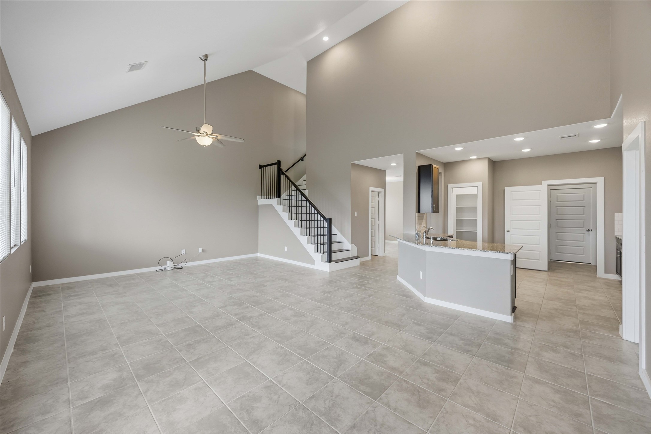 1239 Cascade Hls Drive Rosharon, TX 77583 - Photo 8 of 30 an empty room with wooden floor and a fireplace