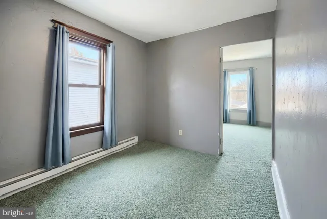 an empty room with windows