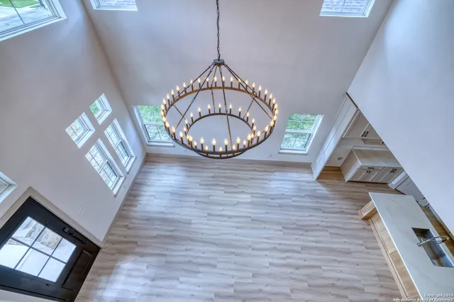 a view of an entryway with wooden floor